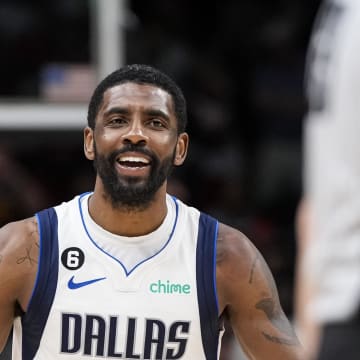 Apr 2, 2023; Atlanta, Georgia, USA; Dallas Mavericks guard Kyrie Irving (2) reacts to being called for a foul on Atlanta Hawks guard Trae Young (11) (not shown) leading to the deciding points during overtime at State Farm Arena. Mandatory Credit: Dale Zanine-USA TODAY Sports