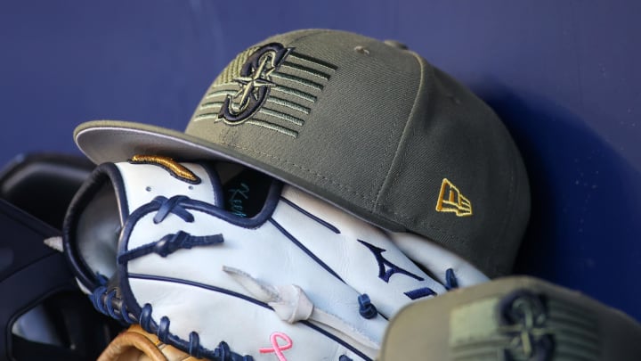 A detailed view of the Seattle Mariners armed forces day hat in the dugout against the Atlanta Braves in the first inning at Truist Park in 2023.