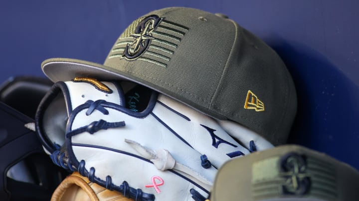 A detailed view of the Seattle Mariners armed forces day hat is pictured in the dugout May 20, 2023, at Truist Park.