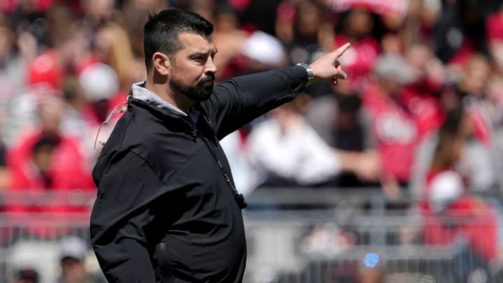 April 13, 2024; Columbus, Ohio, USA; 
Ohio State head football coach Ryan Day speaks to players during the first half of the LifeSports spring football game at Ohio Stadium on Saturday.