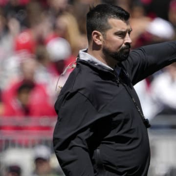 April 13, 2024; Columbus, Ohio, USA; 
Ohio State head football coach Ryan Day speaks to players during the first half of the LifeSports spring football game at Ohio Stadium on Saturday.