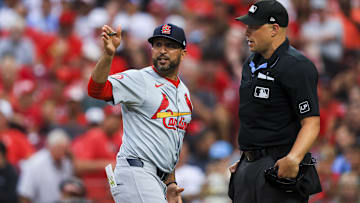 Aug 12, 2024; Cincinnati, Ohio, USA; St. Louis Cardinals manager Oliver Marmol (37) argues with home plate umpire Stu Scheurwater (85) in the fifth inning against the Cincinnati Reds at Great American Ball Park. Mandatory Credit: Katie Stratman-Imagn Images