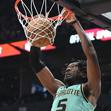 Charlotte Hornets center Mark Williams dunks.