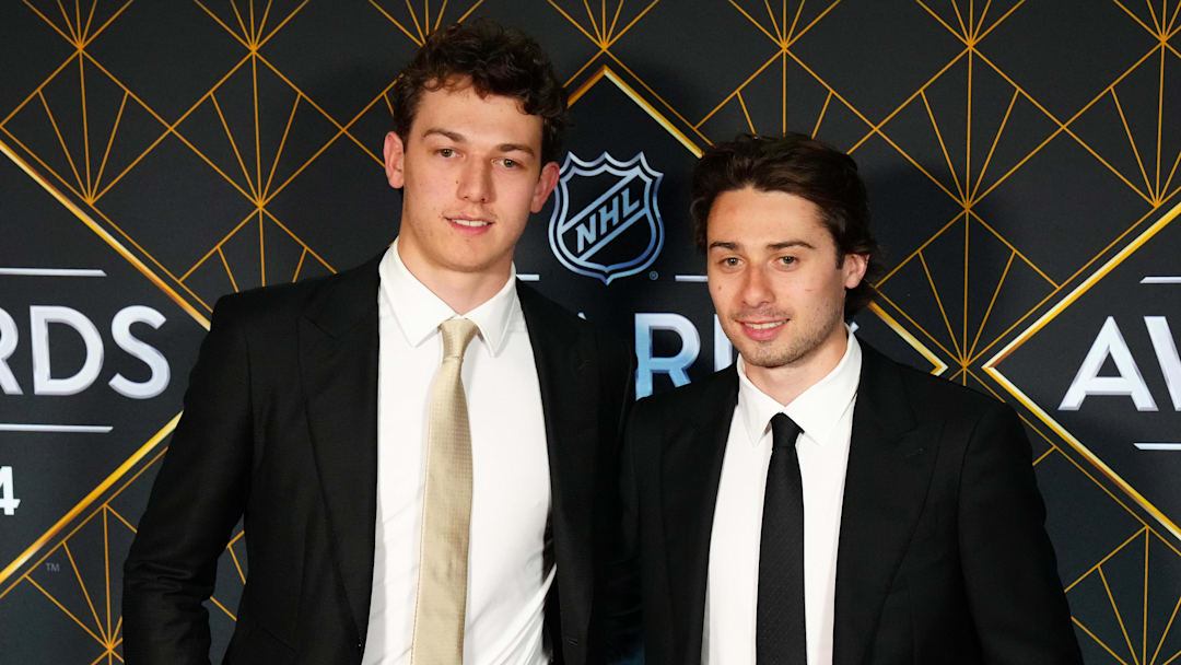 Jun 27, 2024; Las Vegas, Nevada, USA; Luke and Quinn Hughes appear on a red carpet before the start of the 2024 NHL Awards at Fontainebleau Las Vegas. Mandatory Credit: Stephen R. Sylvanie-Imagn Images Jun 27, 2024; Las Vegas, Nevada, USA; Luke and Quinn Hughes appear on a red carpet before the start of the 2024 NHL Awards at Fontainebleau Las Vegas. Mandatory Credit: Stephen R. Sylvanie-Imagn Images