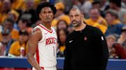 May 2, 2025; San Francisco, California, USA; Houston Rockets forward Amen Thompson (1) meets with Houston Rockets head coach Ime Udoka during a break in the action against the Golden State Warriors in the fourth quarter of game six of the first round for the 2025 NBA Playoffs at Chase Center. Mandatory Credit: Cary Edmondson-Imagn Images