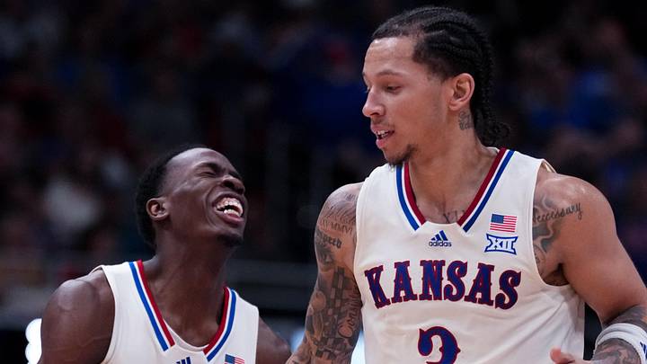 Kansas Jayhawks guards Tre White and Melvin Council Jr.