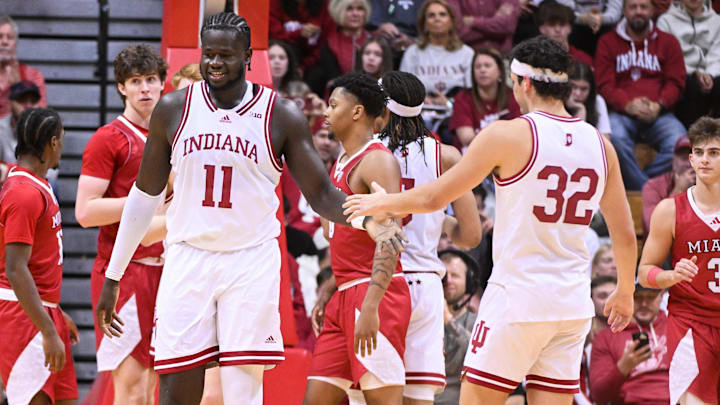 Indiana center Oumar Ballo (11) high-fives Trey Galloway (32) against Miami of Ohio at Simon Skjodt Assembly Hall. Indiana center Oumar Ballo (11) high-fives Trey Galloway (32) against Miami of Ohio at Simon Skjodt Assembly Hall.