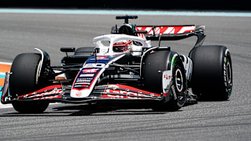 May 3, 2024; Miami Gardens, Florida, USA; Hass drive Kevin Magnussen (20) races into turn one during F1 practice at Miami International Autodrome. Mandatory Credit: John David Mercer-Imagn Images