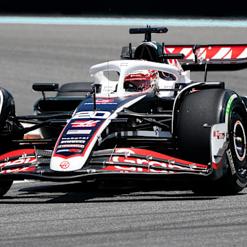 May 3, 2024; Miami Gardens, Florida, USA; Hass drive Kevin Magnussen (20) races into turn one during F1 practice at Miami International Autodrome. Mandatory Credit: John David Mercer-Imagn Images