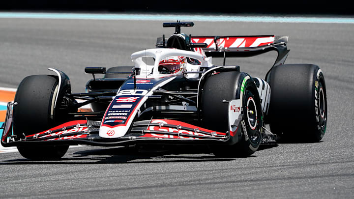 May 3, 2024; Miami Gardens, Florida, USA; Hass drive Kevin Magnussen (20) races into turn one during F1 practice at Miami International Autodrome. Mandatory Credit: John David Mercer-Imagn Images