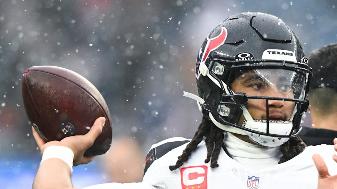 Houston Texans quarterback C.J. Stroud warms up before an AFC Divisional Round game against the New England Patriots.