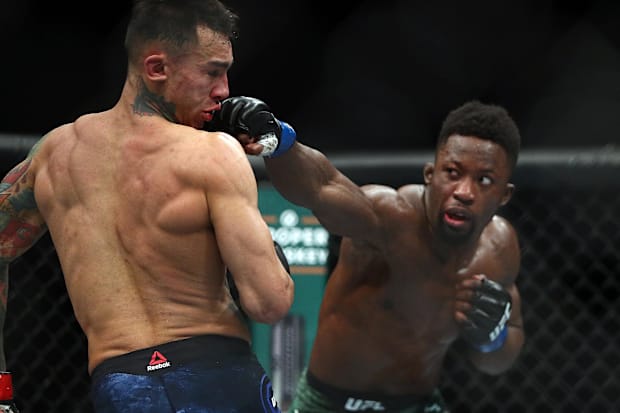 Sodiq Yusuff moves in with a hit against Andre Fili during UFC 246 at T-Mobile Arena. 