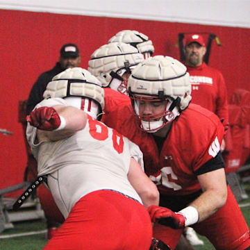 Wisconsin offensive lineman Kerry Kodanko (right) works against Ben Barten (left) during practice on Tuesday April 9, 2024 at the McClain Center in Madison, Wisconsin.