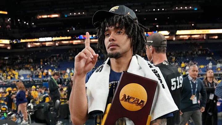 Apr 6, 2026; Indianapolis, IN, USA; Michigan Wolverines guard Elliot Cadeau (3) celebrates after their win against the UConn Huskies in the national championship of the Final Four of the men's 2026 NCAA Tournament between the  and the Michigan Wolverines at Lucas Oil Stadium. Mandatory Credit: Bob Donnan-Imagn Images