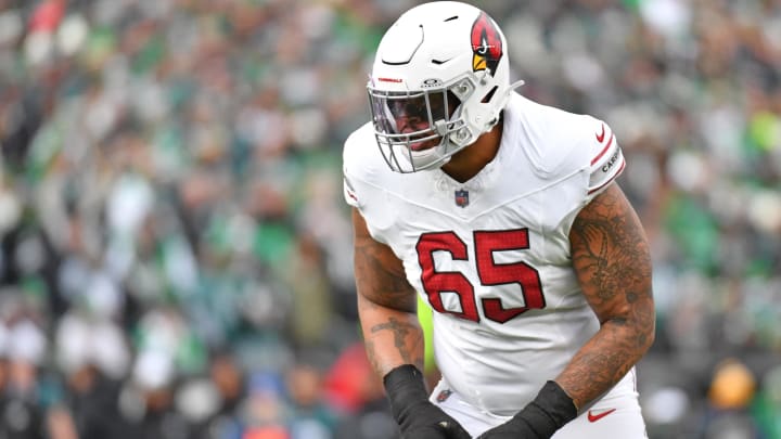 Dec 31, 2023; Philadelphia, Pennsylvania, USA; Arizona Cardinals offensive tackle Elijah Wilkinson (65) against the Philadelphia Eagles at Lincoln Financial Field. Mandatory Credit: Eric Hartline-USA TODAY Sports