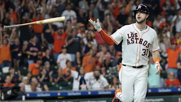 Sep 21, 2024; Houston, Texas, USA; Houston Astros right fielder Kyle Tucker (30) flicks his bat after hitting a home run against the Los Angeles Angels  in the seventh inning at Minute Maid Park. Mandatory Credit: Thomas Shea-Imagn Images