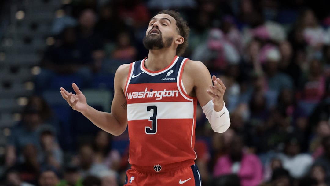 Mar 8, 2026; New Orleans, Louisiana, USA; Washington Wizards guard Trae Young (3) reacts after a three-point basket against the New Orleans Pelicans during the first half at Smoothie King Center. Mandatory Credit: Matthew Hinton-Imagn Images