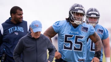 Tennessee Titans Offensive Line Coach Bill Callahan, left, and first-round draft pick JC Latham (55) head to the next drill during rookie minicamp at Ascension Saint Thomas Sports Park in Nashville, Tenn., Friday, May 10, 2024.