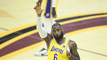 Mar 21, 2022; Cleveland, Ohio, USA; Los Angeles Lakers forward LeBron James (6) waves to fans in the first quarter against the Cleveland Cavaliers at Rocket Mortgage FieldHouse. Mandatory Credit: David Richard-Imagn Images
