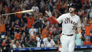 Former Houston Astros right fielder Kyle Tucker (30) flicks his bat after hitting a home run against the Los Angeles Angels  in the seventh inning at Minute Maid Park. 