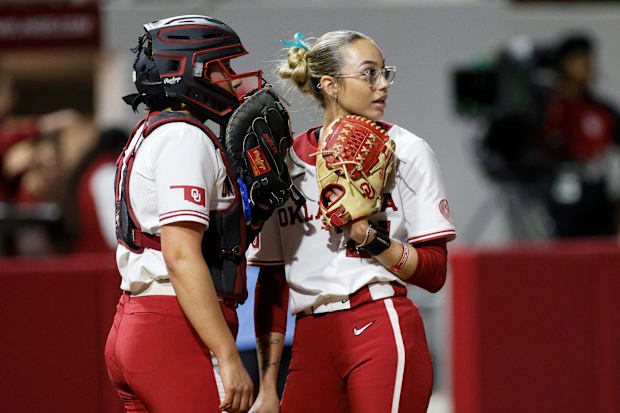 Oklahoma catcher Isabela Emerling and pitcher Sam Landry
