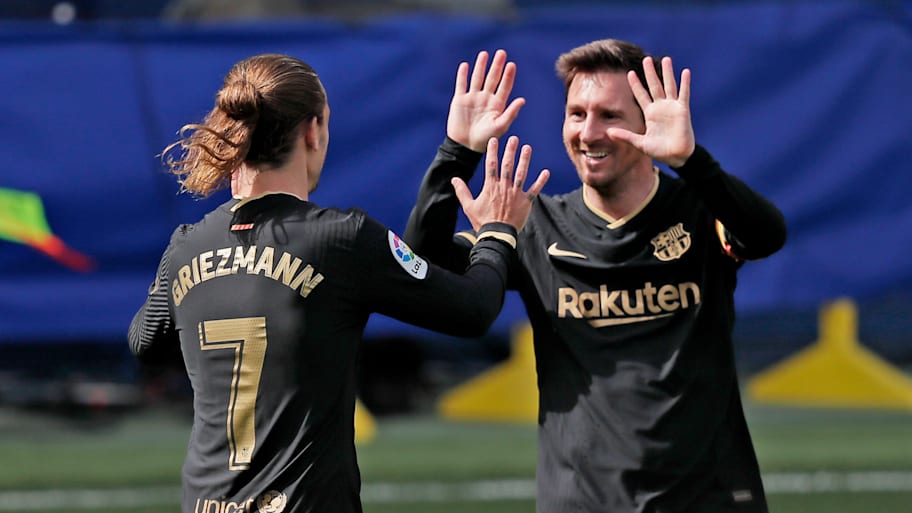 Antoine Griezmann (left) and Lionel Messi.