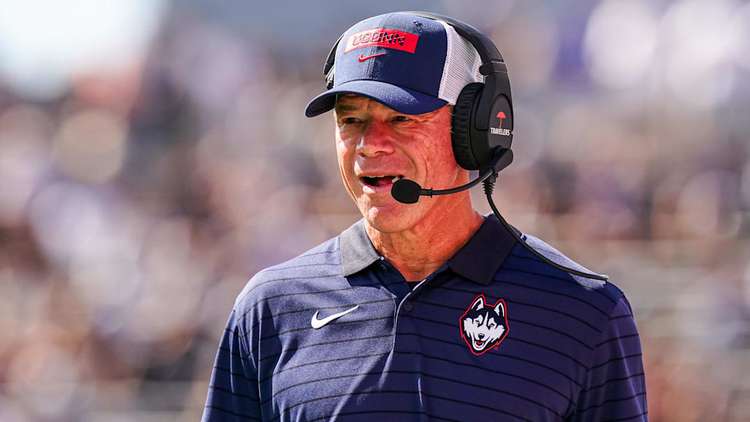 Aug 30, 2025; East Hartford, Connecticut, USA; Connecticut Huskies head coach Jim Mora watches from the sideline as they take on the Central Connecticut State Blue Devils at Pratt & Whitney Stadium at Rentschler Field. Mandatory Credit: David Butler II-Imagn Images