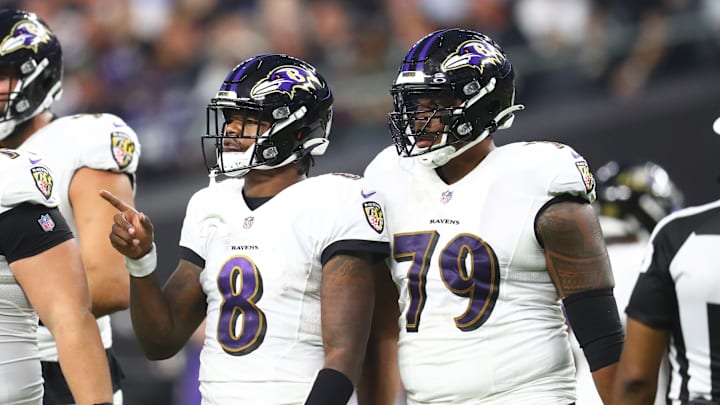 Sep 13, 2021; Paradise, Nevada, USA; Baltimore Ravens quarterback Lamar Jackson (8) and offensive tackle Ronnie Stanley (79) against the Las Vegas Raiders during Monday Night Football at Allegiant Stadium. Mandatory Credit: Mark J. Rebilas-Imagn Images