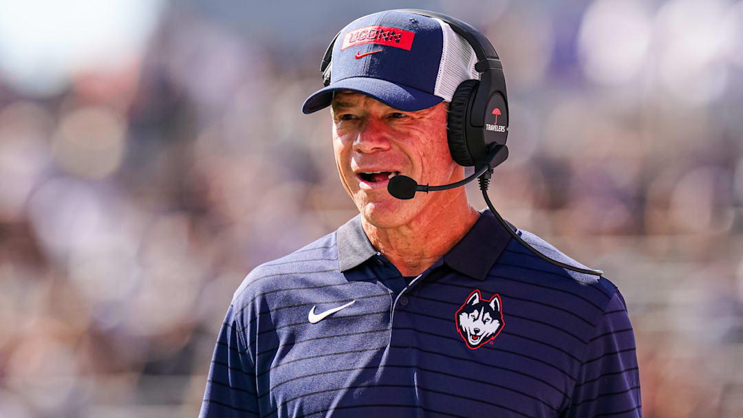 Aug 30, 2025; East Hartford, Connecticut, USA; Connecticut Huskies head coach Jim Mora watches from the sideline as they take on the Central Connecticut State Blue Devils at Pratt & Whitney Stadium at Rentschler Field. Mandatory Credit: David Butler II-Imagn Images