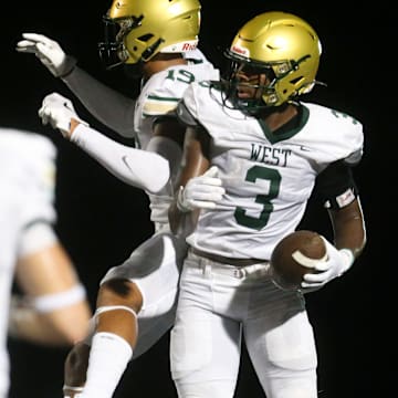 Iowa City West’s Julian Manson (3) celebrates after scoring a touchdown against Iowa City Liberty Friday, Aug. 30, 2024 in North Liberty, Iowa.