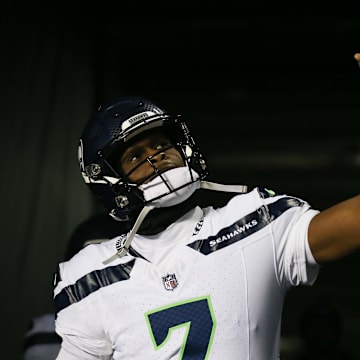 Dec 26, 2024; Chicago, Illinois, USA; Seattle Seahawks quarterback Geno Smith (7) warms up before a game against the Chicago Bears at Soldier Field.