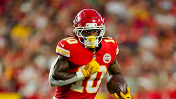 Aug 22, 2025; Kansas City, Missouri, USA; Kansas City Chiefs running back Isiah Pacheco (10) runs the ball during the first half against the Chicago Bears at GEHA Field at Arrowhead Stadium. Mandatory Credit: Jay Biggerstaff-Imagn Images