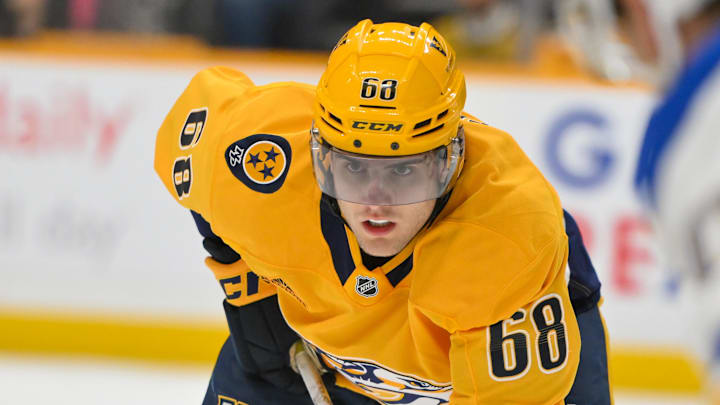 Mar 27, 2025; Nashville, Tennessee, USA;  Nashville Predators left wing Zachary L'Heureux (68) waits for the face-off against the St. Louis Blues during the third period at Bridgestone Arena. Mandatory Credit: Steve Roberts-Imagn Images
