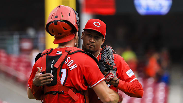 Sep 5, 2024; Cincinnati, Ohio, USA; Cincinnati Reds relief pitcher Alexis Diaz (43) hugs catcher Tyler Stephenson (37) after the victory over the Houston Astros at Great American Ball Park. Mandatory Credit: Katie Stratman-Imagn Images