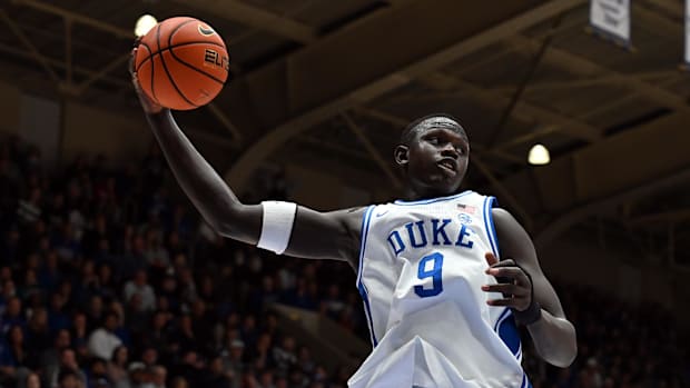 Duke Blue Devils center Khaman Maluach (9) rebounds a ball during the first half against the Miami Hurricanes at Cameron