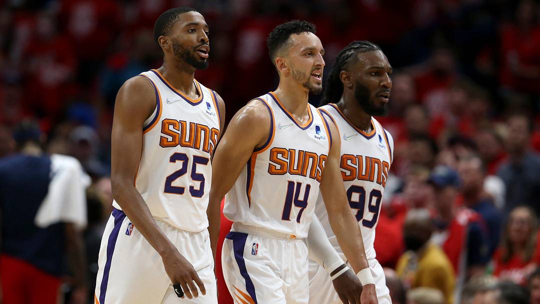 Apr 22, 2022; New Orleans, Louisiana, USA; Phoenix Suns forward Mikal Bridges (25) and guard Landry Shamet (14) and forward Jae Crowder (99) in the second quarter of game three of the first round for the 2022 NBA playoffs at the Smoothie King Center against the New Orleans Pelicans. Mandatory Credit: Chuck Cook-Imagn Images