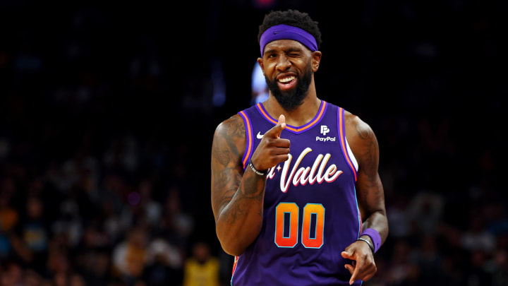 Feb 25, 2024; Phoenix, Arizona, USA; Phoenix Suns forward Royce O'Neale (00) reacts after a play during the second quarter of the game against the Los Angeles Lakers at Footprint Center. Mandatory Credit: Mark J. Rebilas-USA TODAY Sports