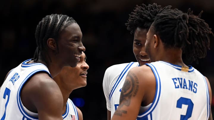 Nov 23, 2025; Durham, North Carolina, USA;  Duke Blue Devils center Patrick Ngongba II (second from right) reacts with teammates after a dunk and being fouled against the Howard Bison.