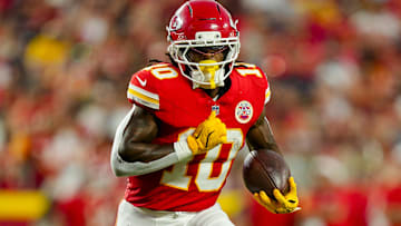 Aug 22, 2025; Kansas City, Missouri, USA; Kansas City Chiefs running back Isiah Pacheco (10) runs the ball during the first half against the Chicago Bears at GEHA Field at Arrowhead Stadium.