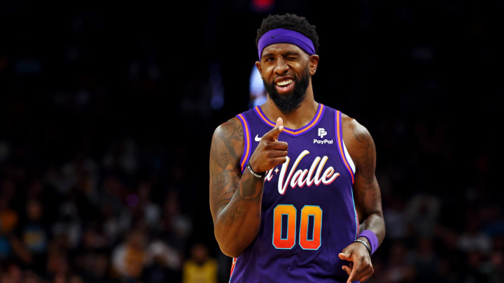 Feb 25, 2024; Phoenix, Arizona, USA; Phoenix Suns forward Royce O'Neale (00) reacts after a play during the second quarter of the game against the Los Angeles Lakers at Footprint Center. Mandatory Credit: Mark J. Rebilas-USA TODAY Sports