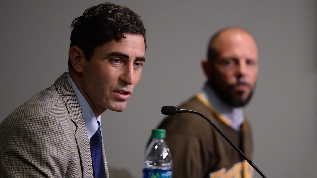 Oct 31, 2019; San Diego, CA, USA; San Diego Padres general manager AJ Preller (left) speaks to the media as manager Jayce Tingler is introduced at Petco Park. Mandatory Credit: Orlando Ramirez-Imagn Images