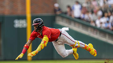Jul 18, 2025; Cumberland, Georgia, USA; Atlanta Braves right fielder Ronald Acuna Jr (13) slides into second base after hitting a double to drive in a run against the New York Yankees during the first inning at Truist Park. Mandatory Credit: Dale Zanine-Imagn Images