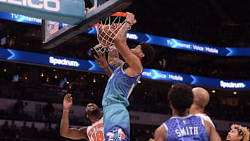 Nov 12, 2021; Charlotte, North Carolina, USA;  Charlotte Hornets center Nick Richards (14) dunks during the second half against the New York Knicks at the Spectrum Center. Mandatory Credit: Sam Sharpe-Imagn Images
