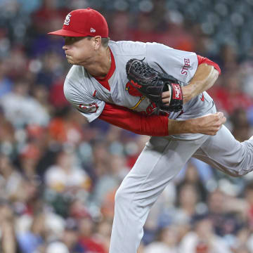 Jun 3, 2024; Houston, Texas, USA; St. Louis Cardinals starting pitcher Kyle Gibson (44) delivetrs a pitch during the first inning against the Houston Astros at Minute Maid Park.