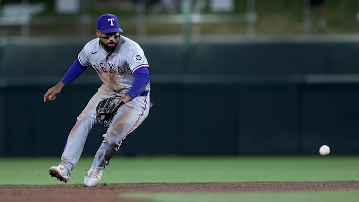 Apr 14, 2026; West Sacramento, California, USA; Texas Rangers second baseman Ezequiel Duran (20) fields a ground ball against the Athletics during the sixth inning at Sutter Health Park. Mandatory Credit: Dennis Lee-Imagn Images