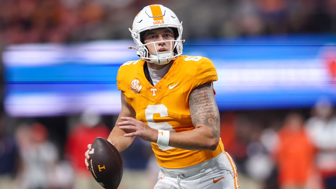 Aug 30, 2025; Atlanta, Georgia, USA; Tennessee Volunteers quarterback Joey Aguilar (6) looks for an open receiver against the Syracuse Orange in the fourth quarter at Mercedes-Benz Stadium. Mandatory Credit: Brett Davis-Imagn Images
