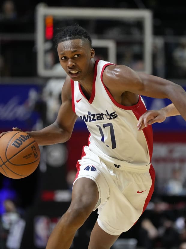 Bub Carrington drives the ball during summer league play.