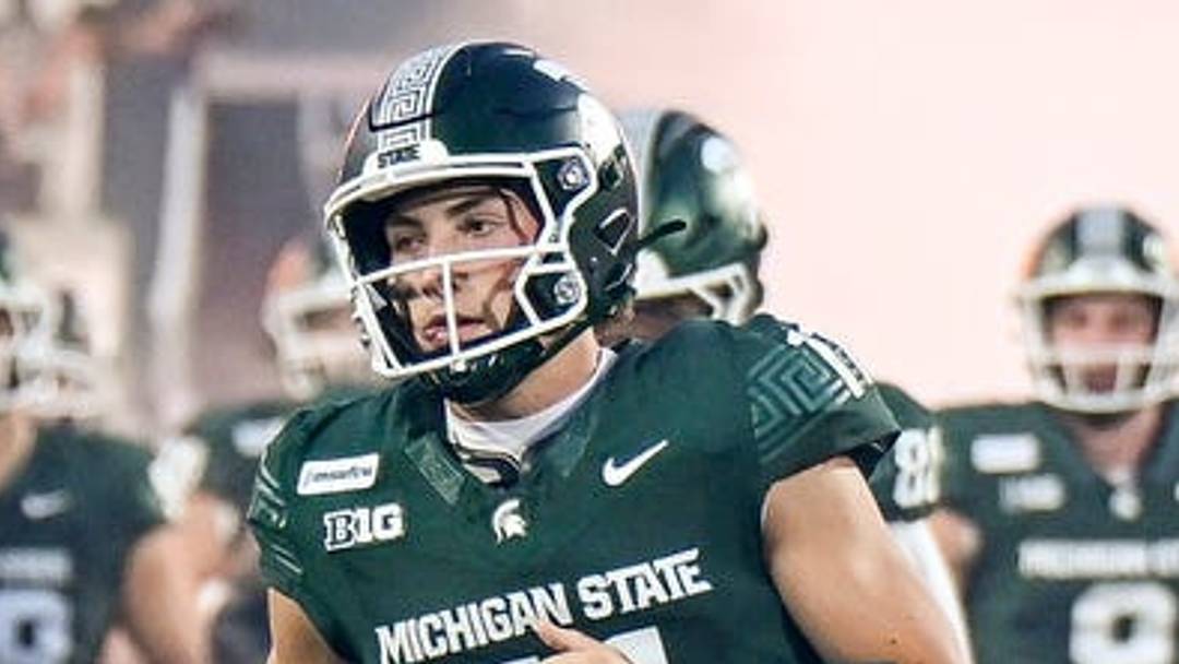 Michigan State’s Alessio Milivojevic, center, runs onto the field with the team before the game against Toledo on Friday, Sept. 4, 2026, at Spartan Stadium in East Lansing.