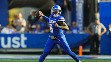 Aug 23, 2025; Lawrence, Kansas, USA; Kansas Jayhawks quarterback Jalon Daniels (6) throws a pass during the first half against the Fresno State Bulldogs at David Booth Kansas Memorial Stadium. Mandatory Credit: Jay Biggerstaff-Imagn Images