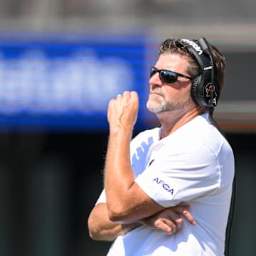 Aug 31, 2024; Nashville, Tennessee, USA;  Virginia Tech Hokies head coach Brent Pry watches from the sideline against the Vanderbilt Commodores during the second half at FirstBank Stadium. Mandatory Credit: Steve Roberts-Imagn Images